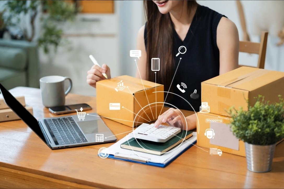 Small business owner managing export logistics using SME trade finance tools to streamline supply chain and payments.