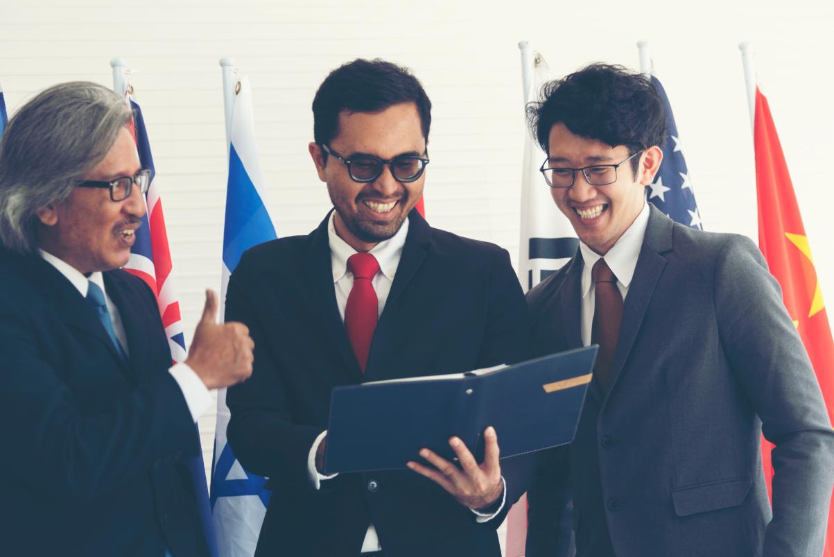 Businessmen are meeting to discuss business plans.
